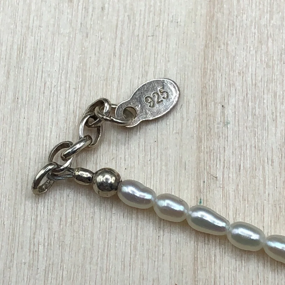 Vintage rice pearls heart charm sterling silver 925 bracelet.
